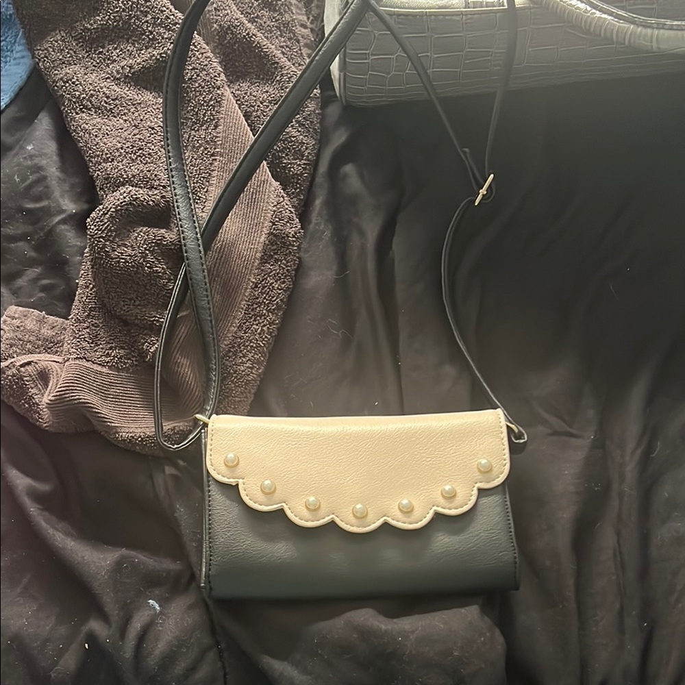 Elegant Black and Cream Crossbody Bag
